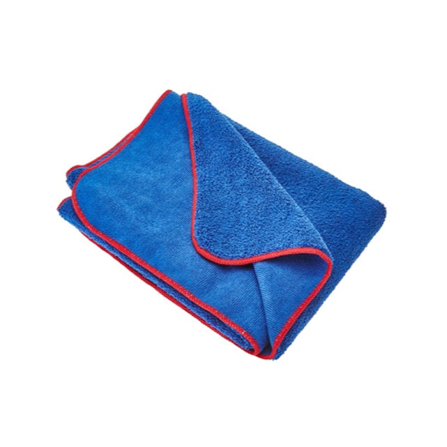 Blue towel with red trim on a white background